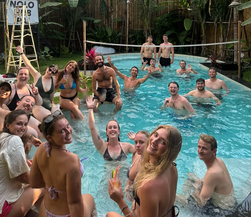 Socialising: guests in the Nolo Hub Pai pool, waving at the camera