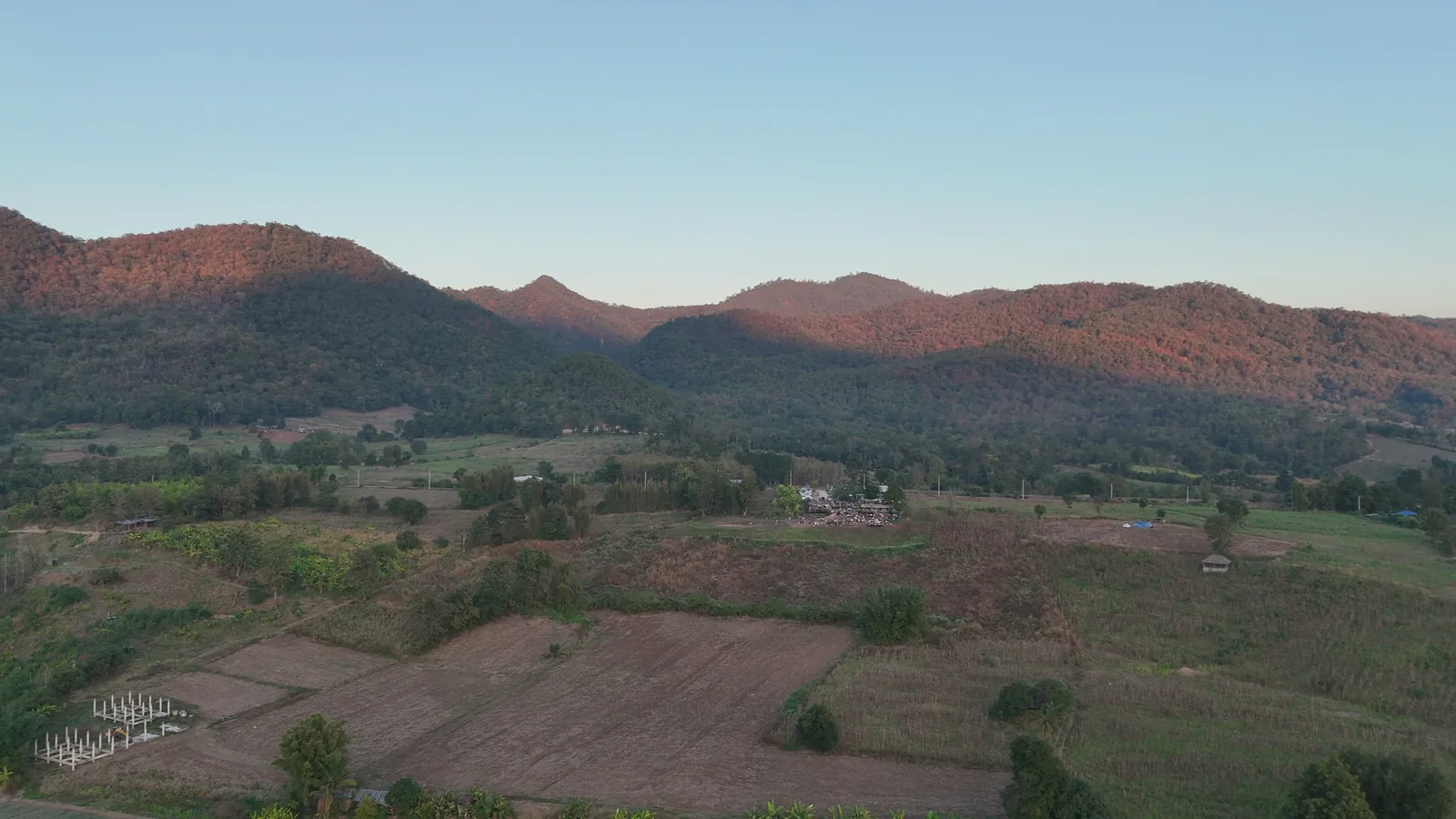 Evening light on the hills across the valley from Two Huts