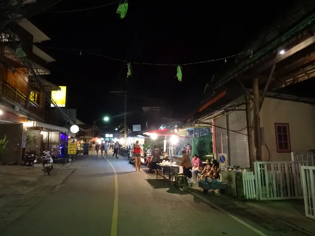Walking Street at night, stalls lit along both sides